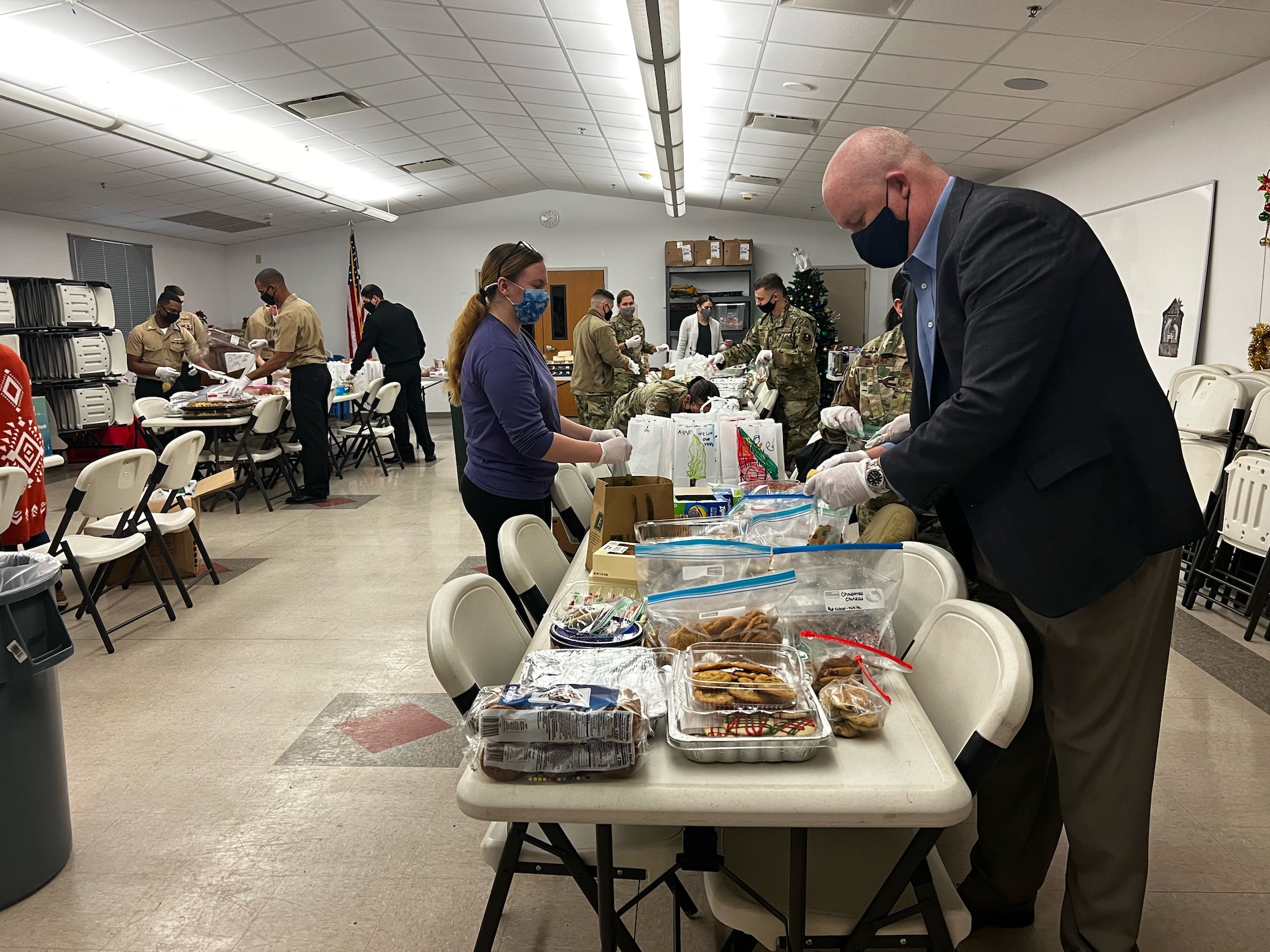 Goodfellow members pack cookies during the Cookie Caper event, Dec. 7, 2021, on Goodfellow Air Force Base, Texas. The Cookie Caper is a coordinated event organized by the base community each year. (Courtesy photo)