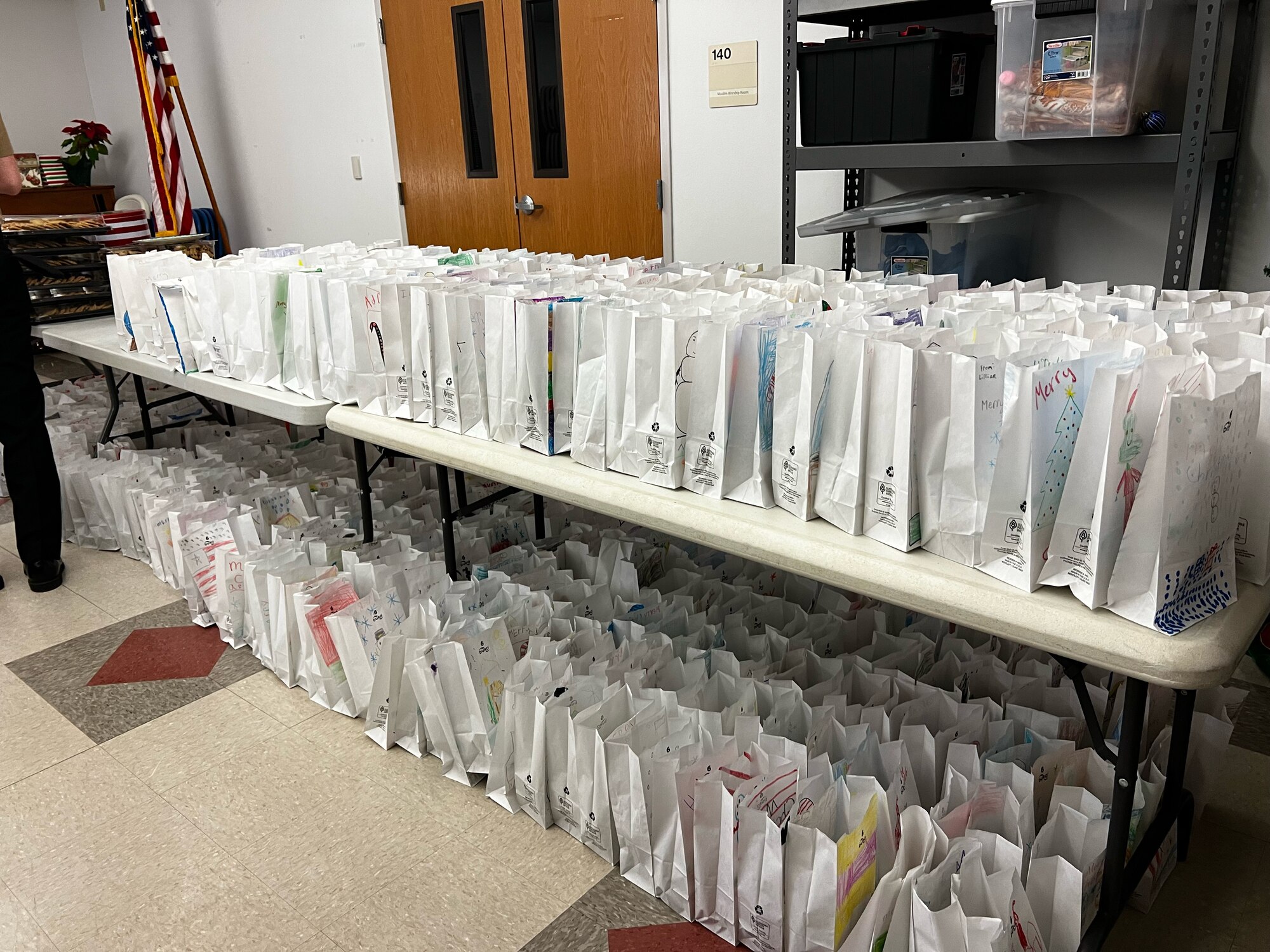 Bags of cookies on a table at the Taylor Chapel during the Cookie Caper event, Dec. 7, 2021, on Goodfellow Air Force Base, Texas. Over 5,300 bags were assembled for distribution. (Courtesy photo)