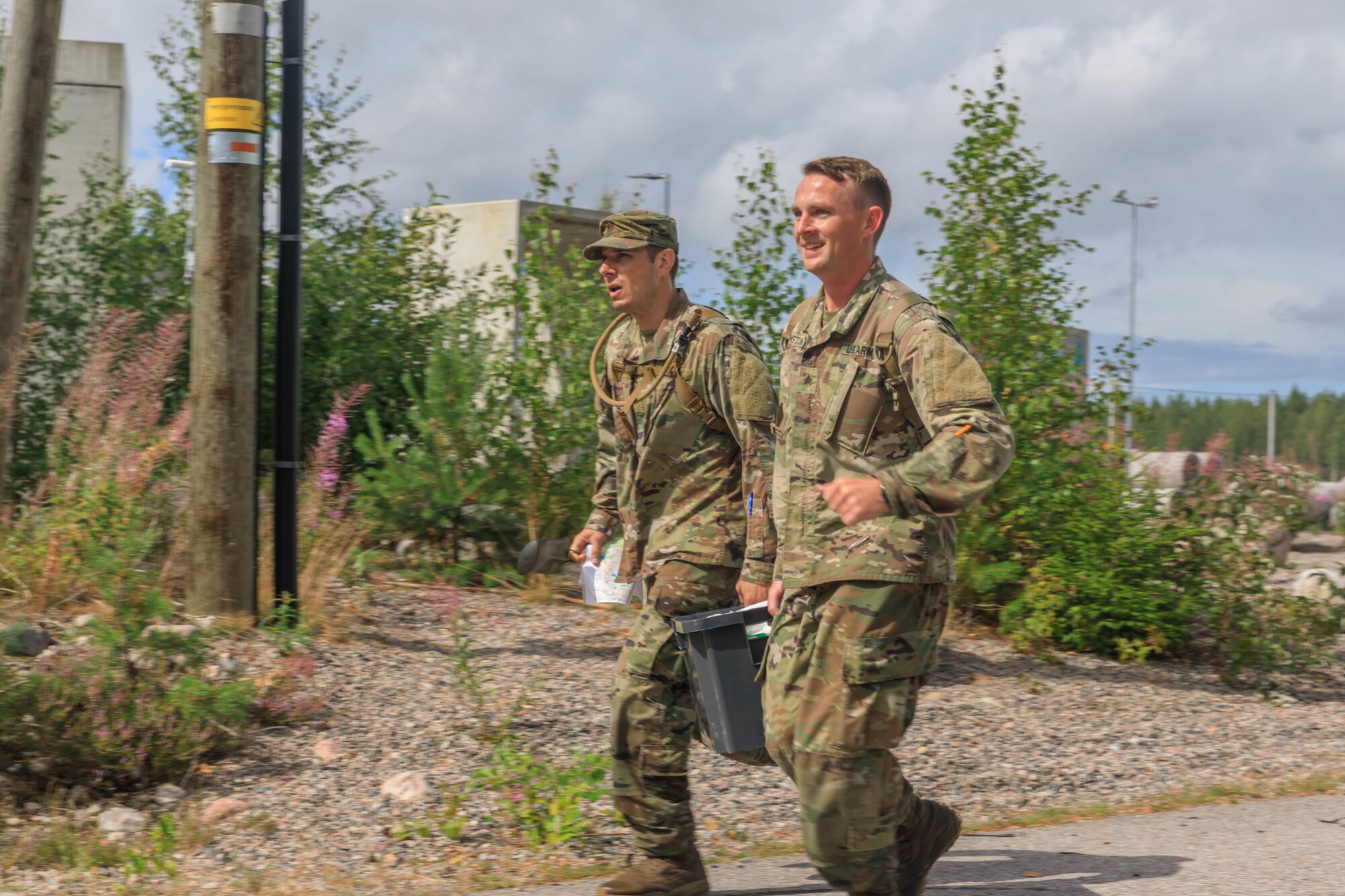 Maj. James Fink (left), 94th Aerial Port Squadron in the 94th Airlift Wing, and Sgt. Michael Yarrington, 108th Training Command, carry a weight to the finish of the orienteering course during the Interallied Confederation of Reserve Officers military competition in Lahti, Finland on August 1st. Teams were given several different maps and tasked with find control points in the woods. The CIOR MILCOMP is an annual competition among NATO and Partnership for Peace nations. This competition test reserve service members from allied nations on several core disciplines in teams of three.