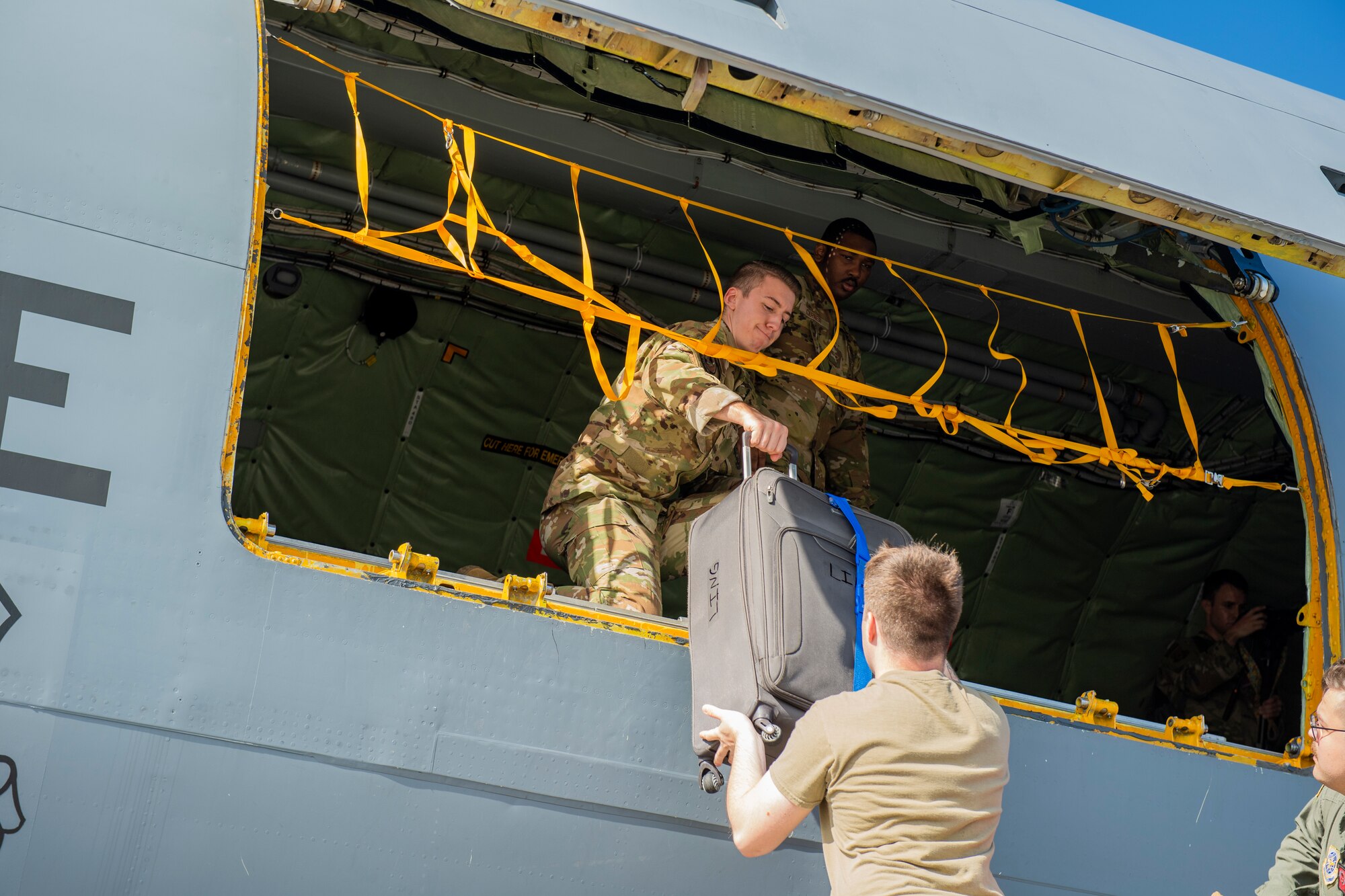 Airmen from the 50th Air Refueling Squadron load a KC-135 Stratotanker aircraft, at MacDill Air Force Base, Florida, Dec. 8, 2021. The 50 ARS Airmen deployed to Al Udeid Air Base, Qatar in support of U.S. Central Forces Command.