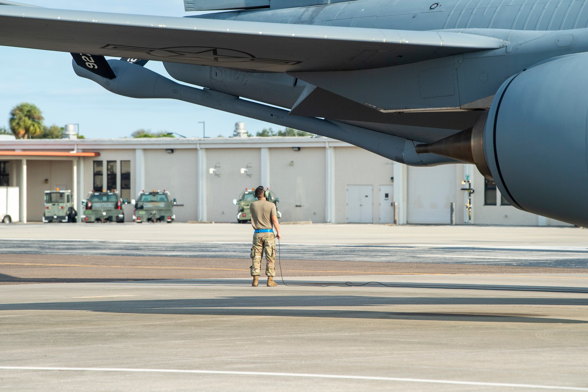 A maintainer with the 6th Aircraft Maintenance Squadron performs a pre-flight check on a KC-135 Stratotanker aircraft assigned to the 50th Air Refueling Squadron at MacDill Air Force Base, Florida, Dec. 8, 2021.