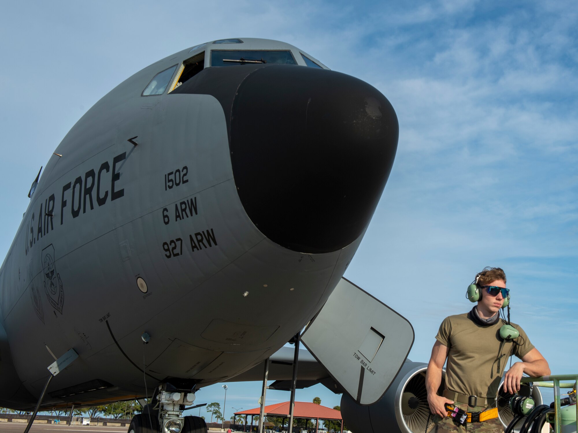 Airman 1st Class Garrett Daily, a maintainer with the 6th Aircraft Maintenance Squadron, pauses while conducting a pre-flight check on a KC-135 Stratotanker aircraft assigned to the 50th Air Refueling Squadron at MacDill Air Force Base, Florida, Dec. 8, 2021.