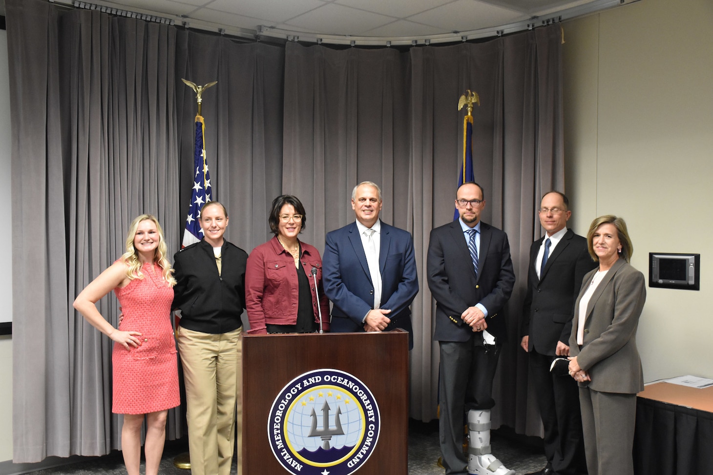 Jennifer Hailes, Deputy Technical Director, Naval Meteorology and Oceanography Command (CNMOC), far right, and CELP graduates pose for a group photo at the FY2020 CNMOC Executive Leadership Program graduation ceremony at Stennis Space Center, MS, Nov. 19, 2021. CNMOC directs and oversees more than 2,500 globally-distributed military and civilian personnel who collect, process and exploit environmental information to assist Fleet and Joint Commanders in all warfare areas to make better decisions faster than the adversary.