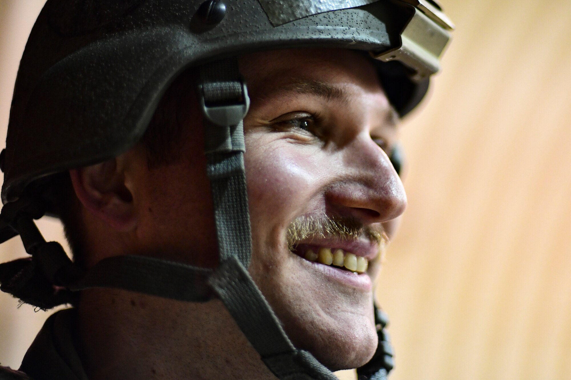 An Airman smiles.