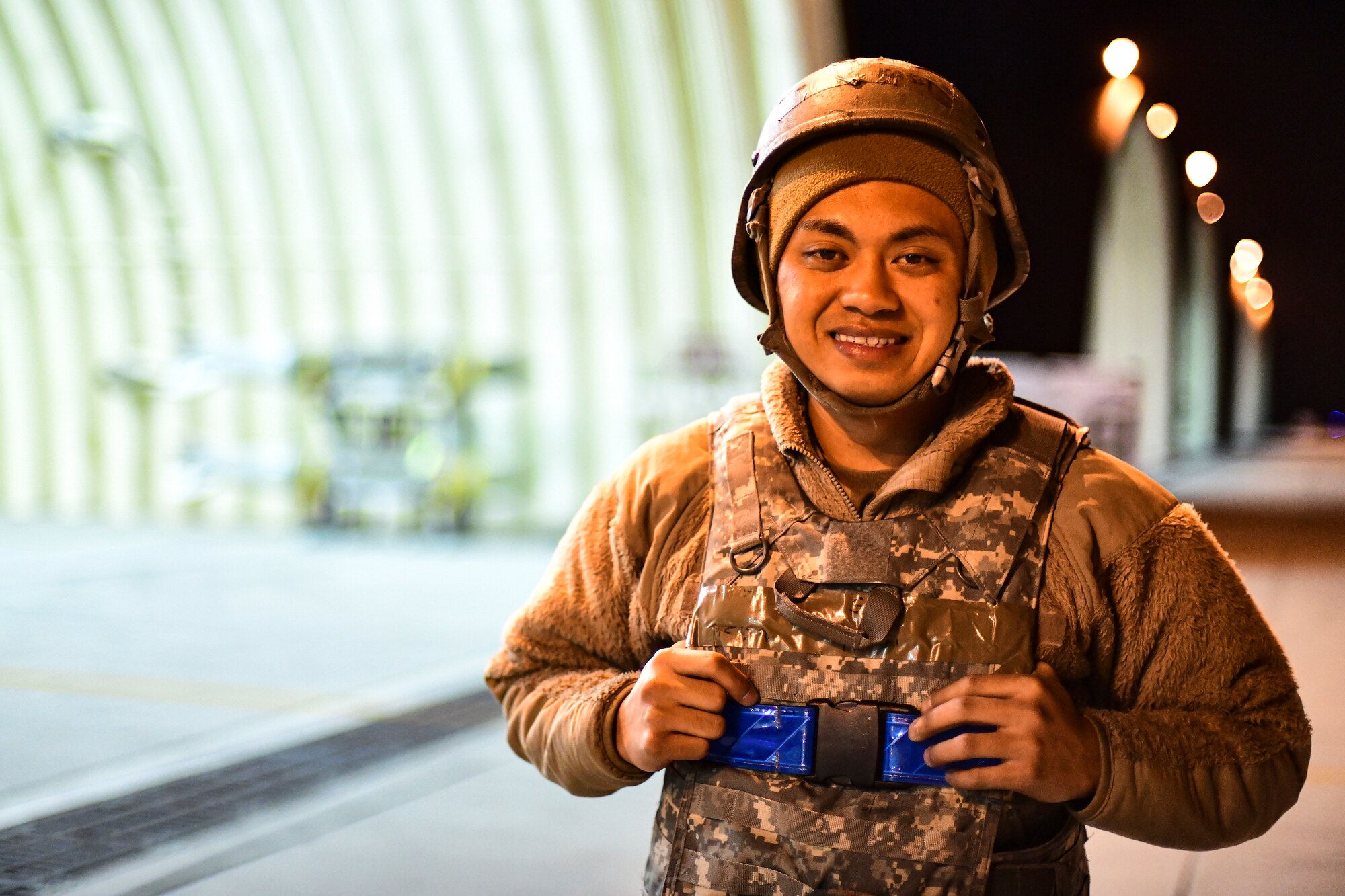 An Airman smiles.
