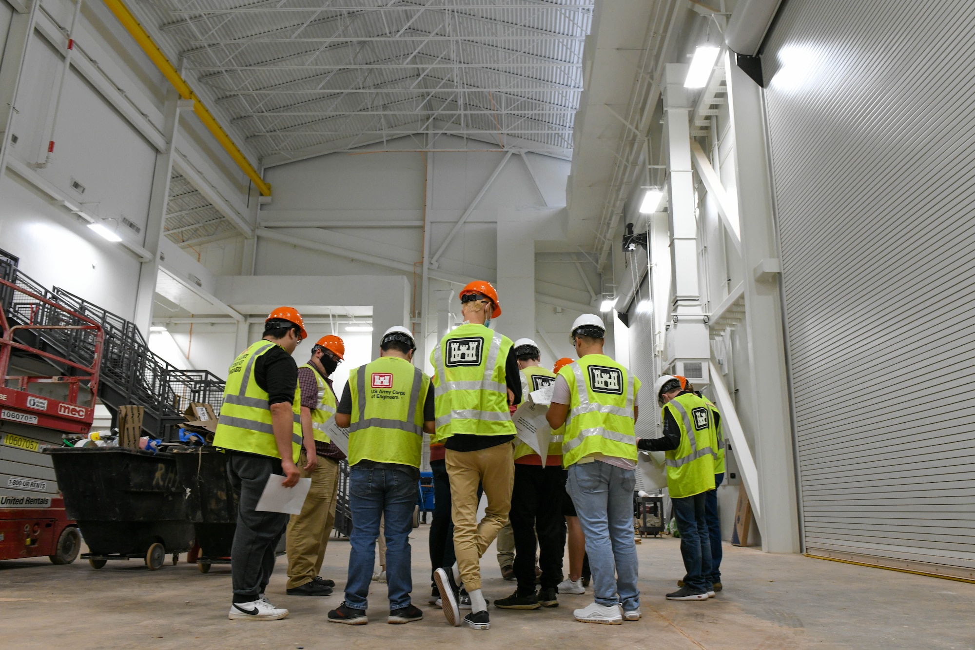 Students from Cameron University observe a hangar under construction on Altus Air Force Base (AAFB), Oklahoma, Dec. 3, 2021. The students were able to see first hand what different disciplines of engineers do around AAFB, including operations, installation management, fire and emergency services and emergency management. (U.S. Air Force photo by Airman 1st Class Trenton Jancze)