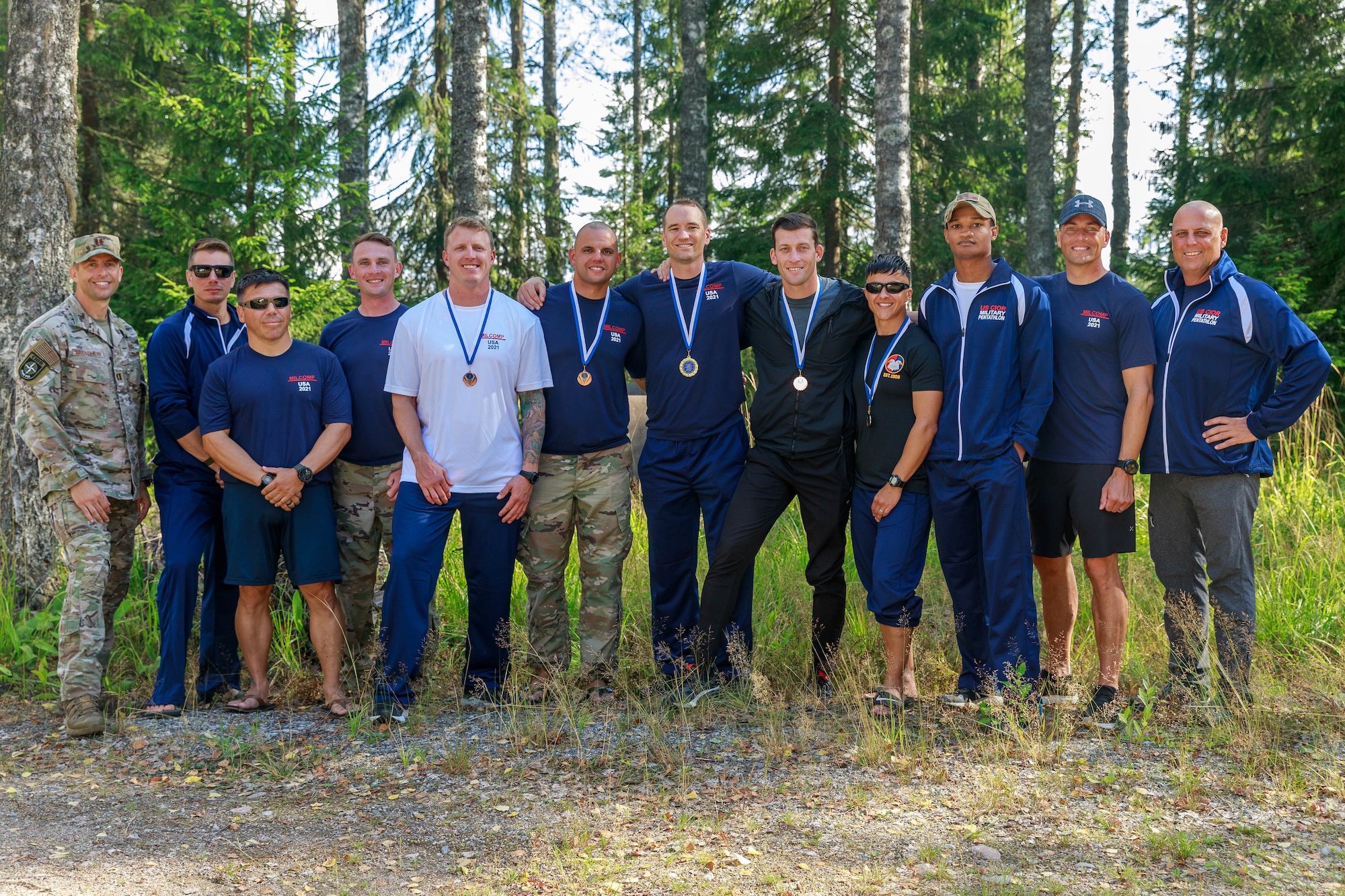 Team USA poses for a picture after the the closing ceremony in Lahti, Finland on August 1st. This team was composed of reserve service members from three nations, Finland, Denmark and the United States of America. The CIOR MILCOMP is an annual competition among NATO and Partnership for Peace nations. This competition test reserve service members from allied nations on several core disciplines in teams of three.