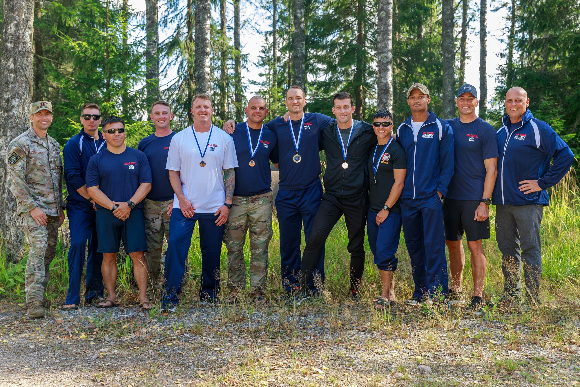 Team USA poses for a picture after the the closing ceremony in Lahti, Finland on August 1st. This team was composed of reserve service members from three nations, Finland, Denmark and the United States of America. The CIOR MILCOMP is an annual competition among NATO and Partnership for Peace nations. This competition test reserve service members from allied nations on several core disciplines in teams of three.