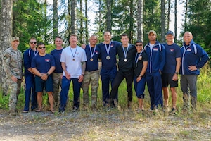 Team USA poses for a picture after the the closing ceremony in Lahti, Finland on August 1st. This team was composed of reserve service members from three nations, Finland, Denmark and the United States of America. The CIOR MILCOMP is an annual competition among NATO and Partnership for Peace nations. This competition test reserve service members from allied nations on several core disciplines in teams of three.