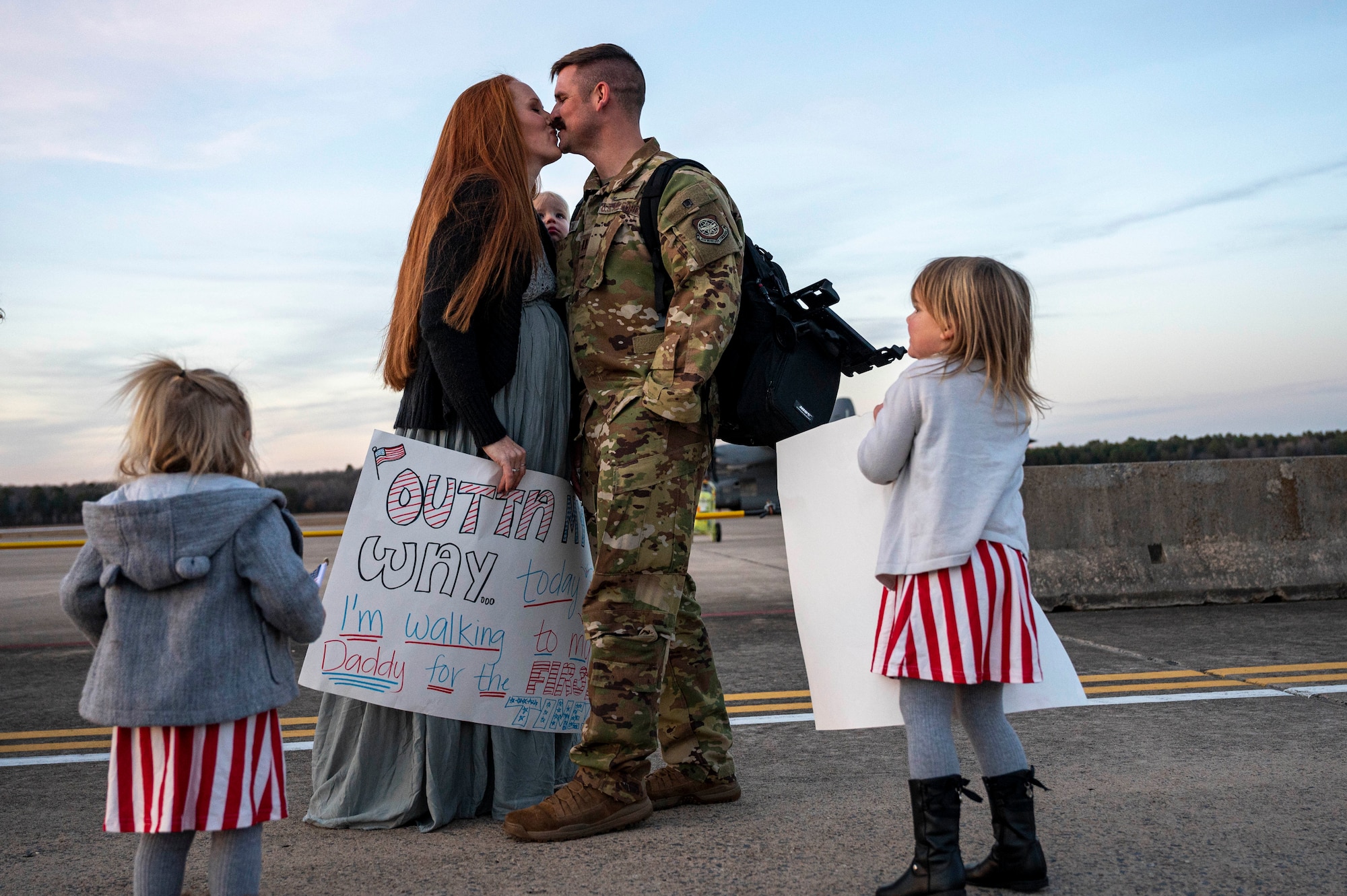 An Airmen greets his family upon returning from deployment.