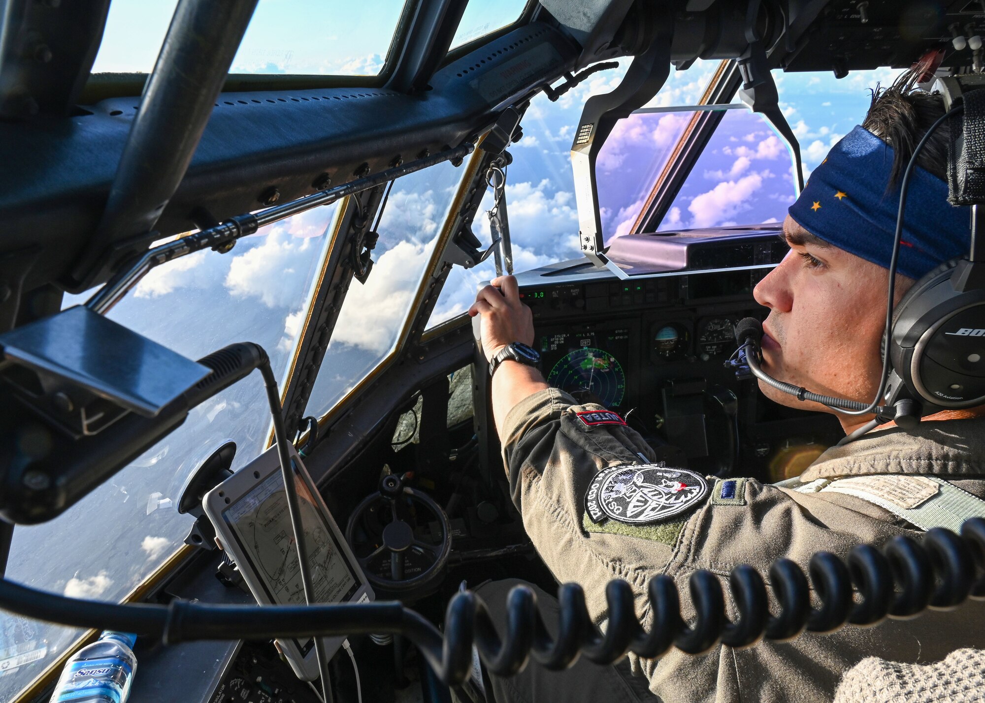 U.S. Air Force 1st Lt. TJ Yonkauske, a pilot assigned to the 36th Airlift Squadron, Yokota Air Base, Japan, prepares to land a U.S. Air Force C-130J during the last day of flights to drop bundles during Operation Christmas Drop at Andersen Air Force Base, Dec. 10, 2021. OCD is the Department of Defense’s longest-running humanitarian airlift operation, beginning in 1952. Today, airdrop operations include more than 55 islands throughout the Pacific. (U.S. Air Force photo by Senior Airman Aubree Owens)