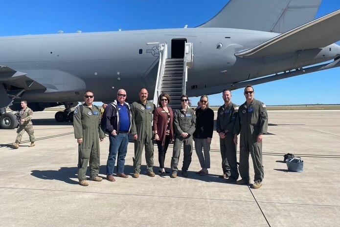 Civic leaders from the Altus community and aircrew members from the 56th Air Refueling Squadron (ARS) pose for a photo with an Altus AFB-based KC-46 Pegasus, at Laughlin AFB, Texas