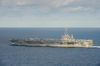 211013-N-FB730-1102 ATLANTIC OCEAN (Oct. 13, 2021) The Nimitz-class aircraft carrier USS Harry S. Truman (CVN 75) transits the Atlantic Ocean during a restricted maneuvering exercise. Truman is operating in the Atlantic Ocean in support of naval operations to maintain maritime stability and security in order to ensure access, deter aggression and defend U.S., allied and partner interests. (U.S. Navy Photo by Mass Communication Specialist 3rd Class Justin Woods)