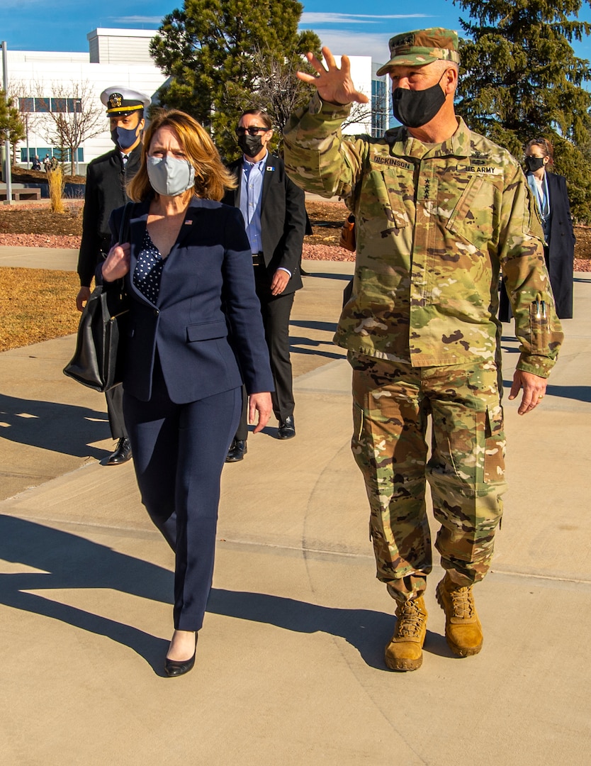 Army general and Deputy Secretary of Defense meet.