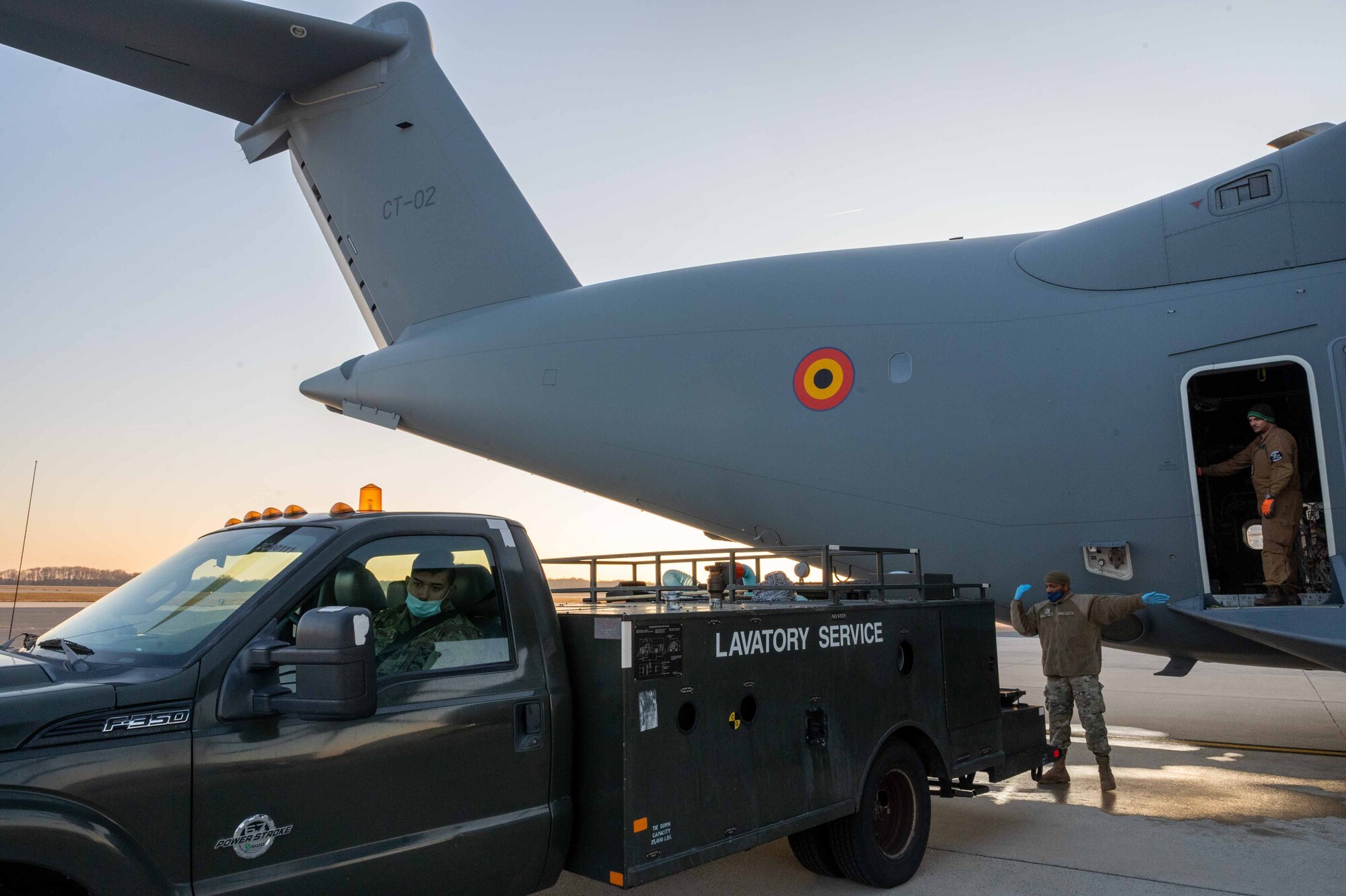 Airmen from 436th Maintenance Squadron fleet services perform service on a Belgian air force A400M Atlas during a foreign military sales mission at Dover Air Force Base, Delaware, Dec. 9, 2021. Missions such as this strengthen the alliance between the U.S. and Belgium. The U.S. and Belgium work bilaterally and in international and regional organizations to encourage economic and political cooperation and assistance to developing countries. (U.S. Air Force photo by Senior Airman Faith Schaefer)