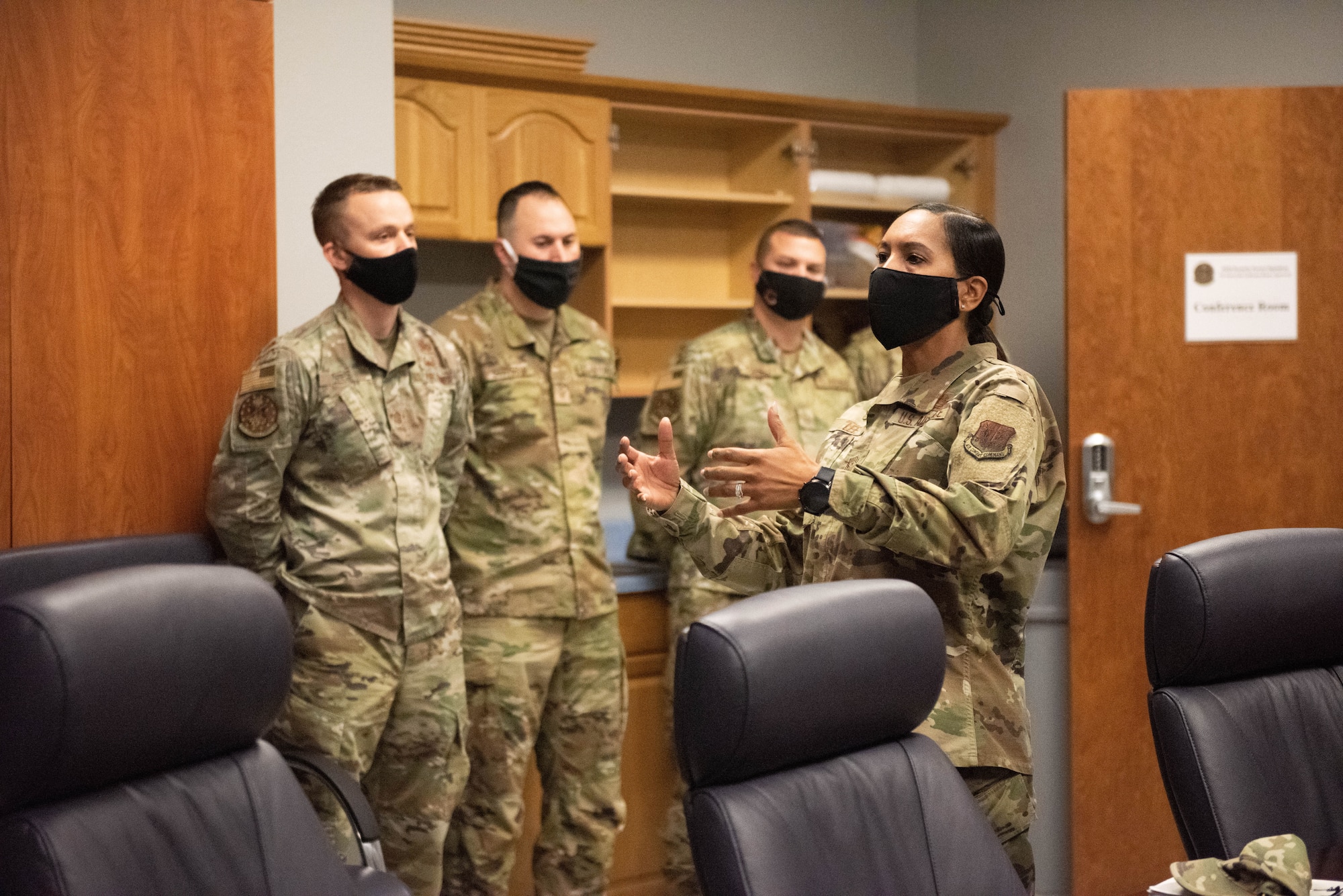 Chief Master Sgt. Sonia T. Lee, Fifteenth Air Force command chief, speaks with supervisors in the 432d Security Forces Squadron.