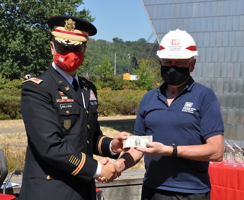 Photo of Army Corps of Engineers Seattle District Commander Col. Alexander ‘Xander’ Bullock and Robert “Rob” Frazier, during the district’s Corps Day awards ceremony, at its headquarters in Seattle, July 29, 2021.