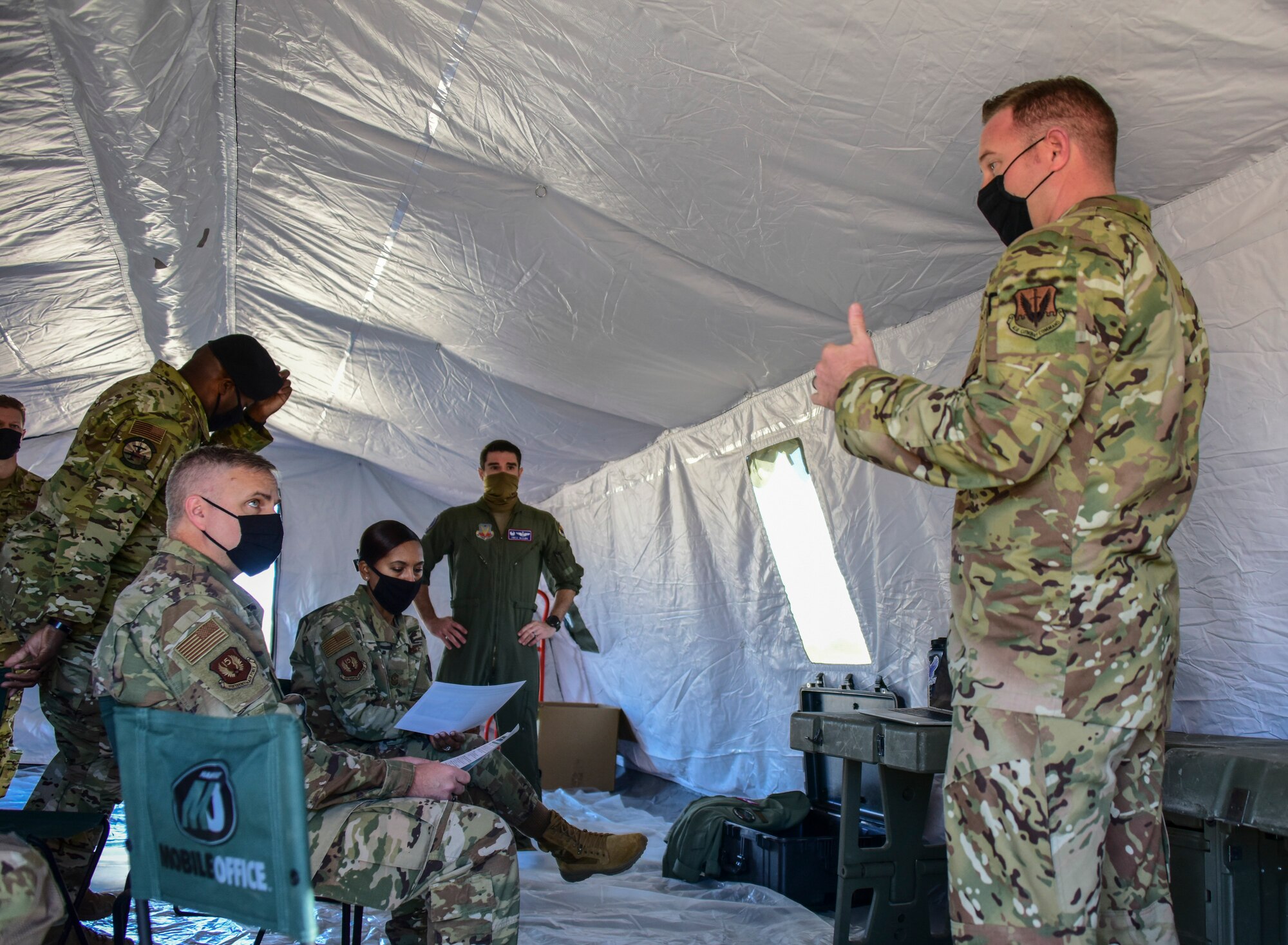 A photo of Airmen briefing.