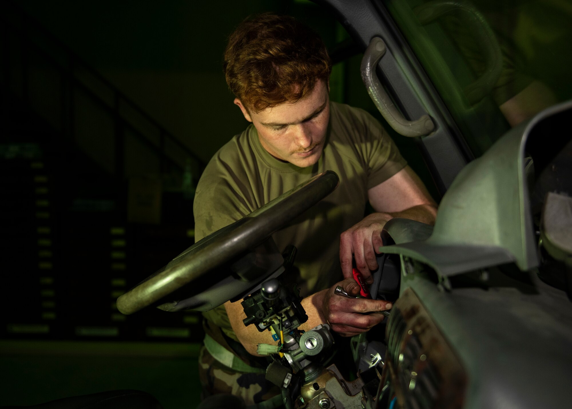 Senior Airman Thomas Matthews, 8th Logistics Readiness Squadron general purpose NCO in charge, replaces a brake master cylinder at Kunsan Air Base, Republic of Korea, Nov. 3, 2021. Vehicle management specialists receive training on a wide variety of areas such as gasoline and diesel engines to hydraulic and air systems. (U.S. Air Force photo by Staff Sgt. Suzie Plotnikov)