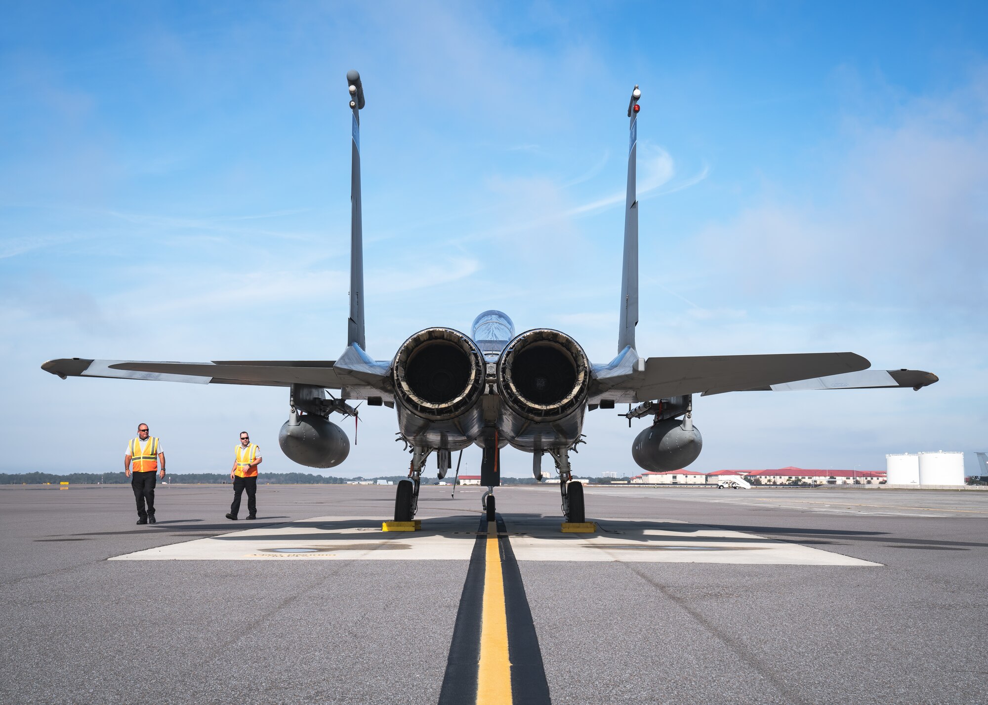 Scott Ramsauer, 6th Aircraft Maintenance Squadron lead servicer, and Robert Hallums, 6th Maintenance Squadron lead servicer, inspect an F-15C Eagle aircraft assigned to the 159th Fighter Squadron, Jacksonville Air National Guard Base, prior to it taking off at MacDill Air Force Base, Florida, Dec. 3, 2021.