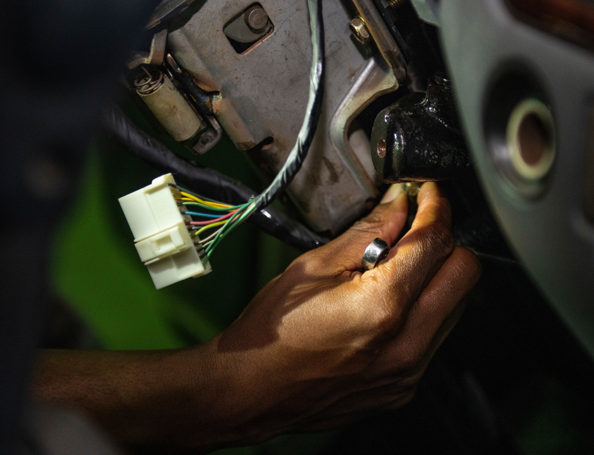 Tech. Sgt. Roderick McKenzie, 8th Logistics Readiness Squadron firetruck and refueling maintenance section chief, replaces a brake master cylinder at Kunsan Air Base, Republic of Korea, Nov. 3, 2021. Vehicle management specialists inspect, troubleshoot and repair vehicles to ensure the Wolf Pack carries out the mission. (U.S. Air Force photo by Staff Sgt. Suzie Plotnikov)