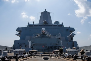 Amphibious transport dock USS Portland (LPD 27) transits the Gulf of Aden, Dec. 13, with a Solid State Laser – Technology Maturation Laser Weapons System Demonstrator Mark 2 MOD 0 on board. The Office of Naval Research selected Portland to host the laser weapon technology in 2018.