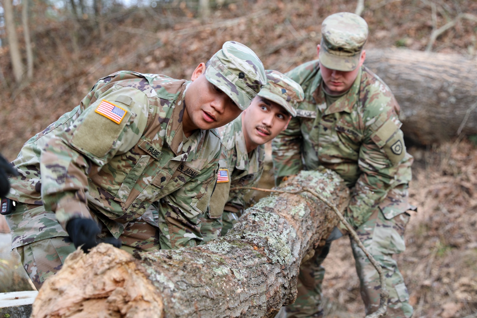 Kentucky National Guard Soldiers from the 130th Engineer Support Company help clear debris off roads in Dawson Springs, Ky., Dec. 14, 2021.