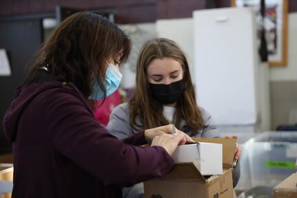 U.S. Army Reserve Officer and Students Donate School Supplies