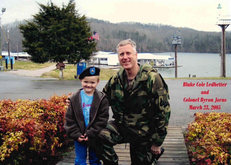 Former Nashville District Engineer Lt. Col. Byron Jorns poses with young Blake Ledbetter March 23, 2005 during Willow Grove Marina’s initial Clean Marina certification dedication and celebration at Willow Grove Marina in Allons, Tennessee.