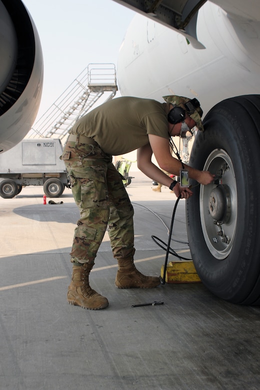 An airman does aircraft maintenance.
