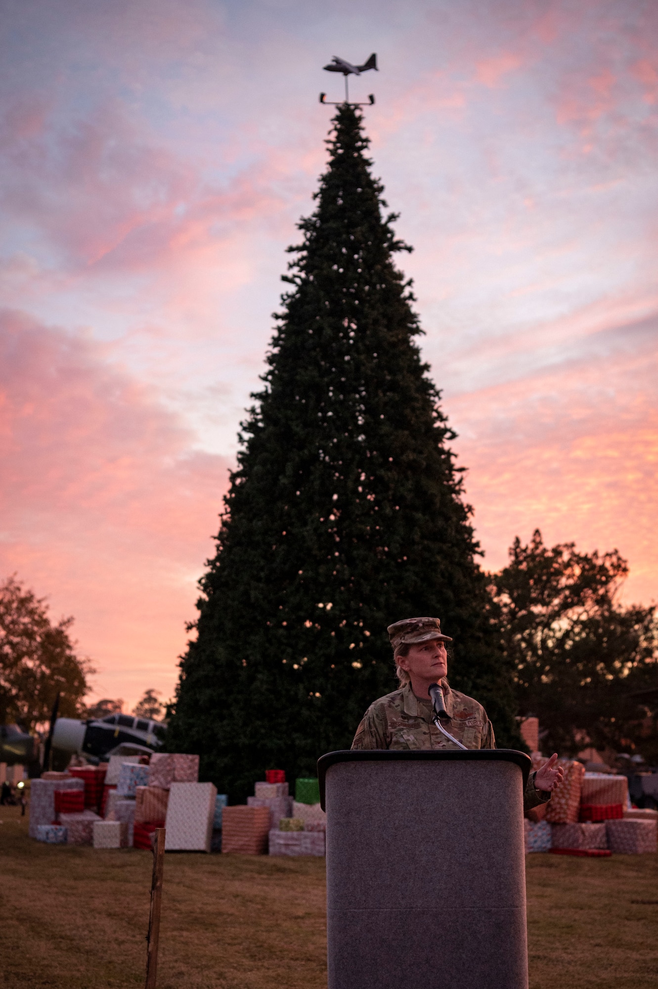 U.S. Air Force Col. Jocelyn Schermerhorn, 1st Special Operations Wing commander, delivers a speech during the annual tree lighting ceremony