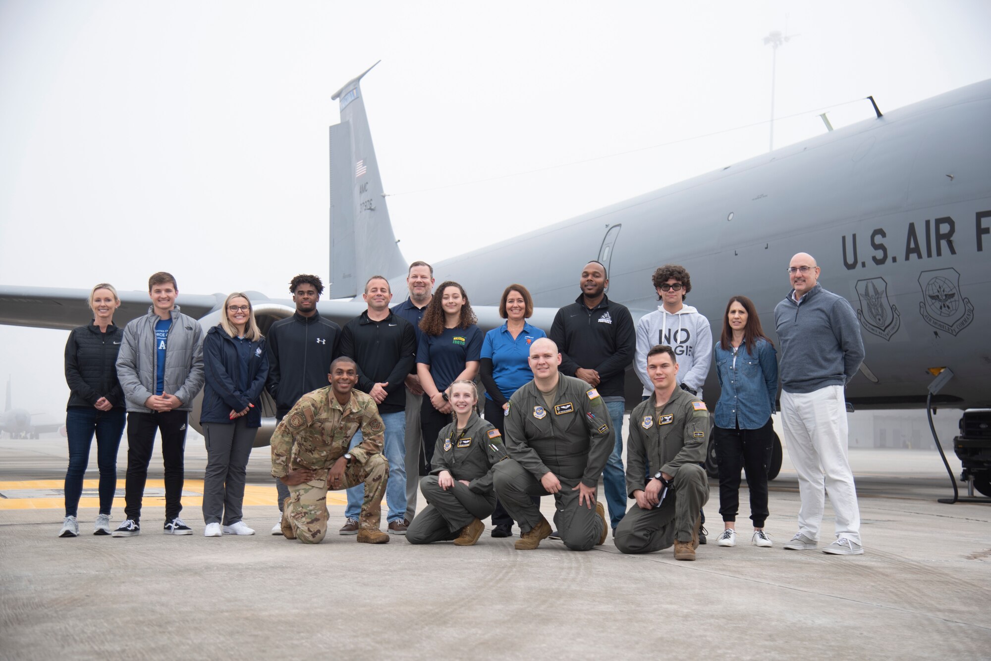 Students and administrators from the Hillsborough County School District (HCSD) pose for a photo with aircrew assigned to the 91st Air Refueling Squadron, Dec. 9, 2021, at MacDill Air Force Base, Florida.