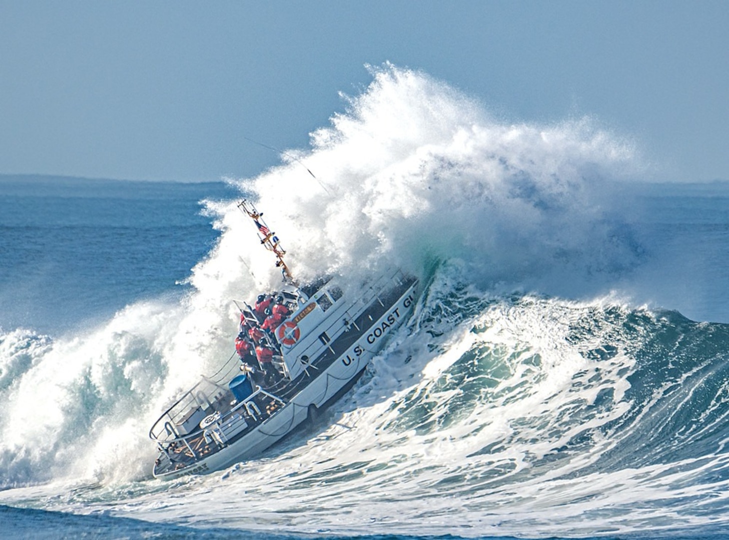 Coast Guard cresting a wave