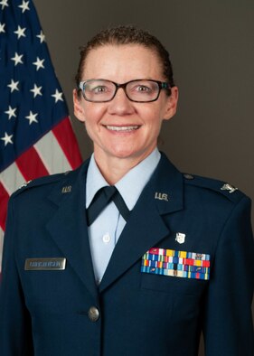 An official portrait of a women in military uniform