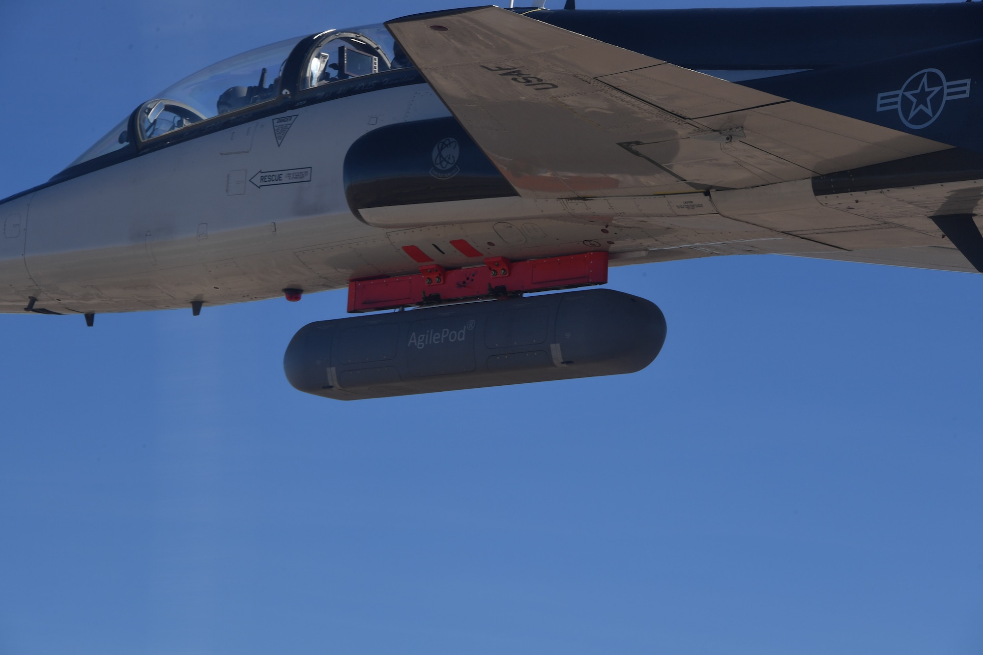 A PNT AgilePod attached to a T-38C successfully demonstrated fully-remote interfacing and alt-PNT data transmission, and performance over both land and water during flight tests November 1-10. (U.S. Air Force photo/2nd Lt. Bowen Lin, 586th Flight Test Squadron)