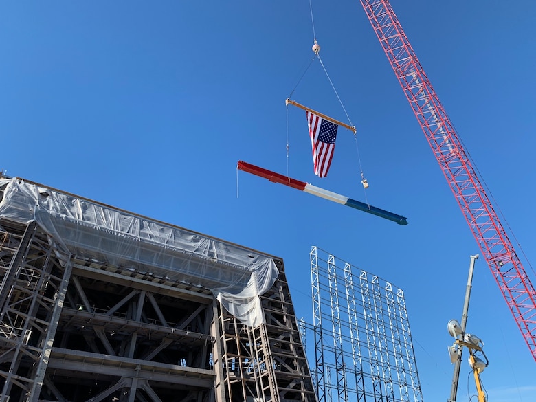 A crane places the final structural beam for the long range discrimination radar’s equipment shelter foundation on June 4, 2019 at Clear Space Force Station in Alaska.
