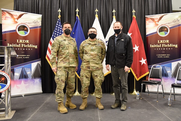 From left: Col. Damon Delarosa, commander of the U.S. Army Corps of Engineers – Alaska District; Lt. Col. William Hassey, commander of Clear Space Force Station; and Randy Bowker, deputy for program management at the Alaska District; attend the initial fielding ceremony for the long range discrimination radar on Dec. 6 at Clear Space Force Station.