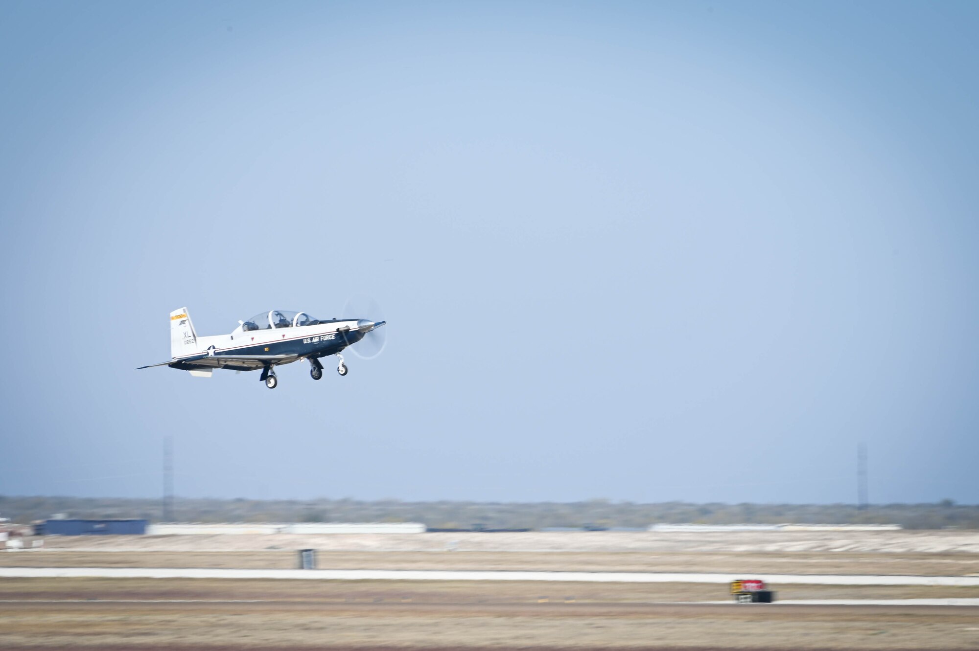 A T-6 Texan II takes off at Laughlin Air Force Base, Texas, Dec. 10, 2021. The T-6 is the primary trainer aircraft used for U.S. Air Force and allied nation pilot training. (U.S. Air Force photo by Airman 1st Class Kayla Christenson)