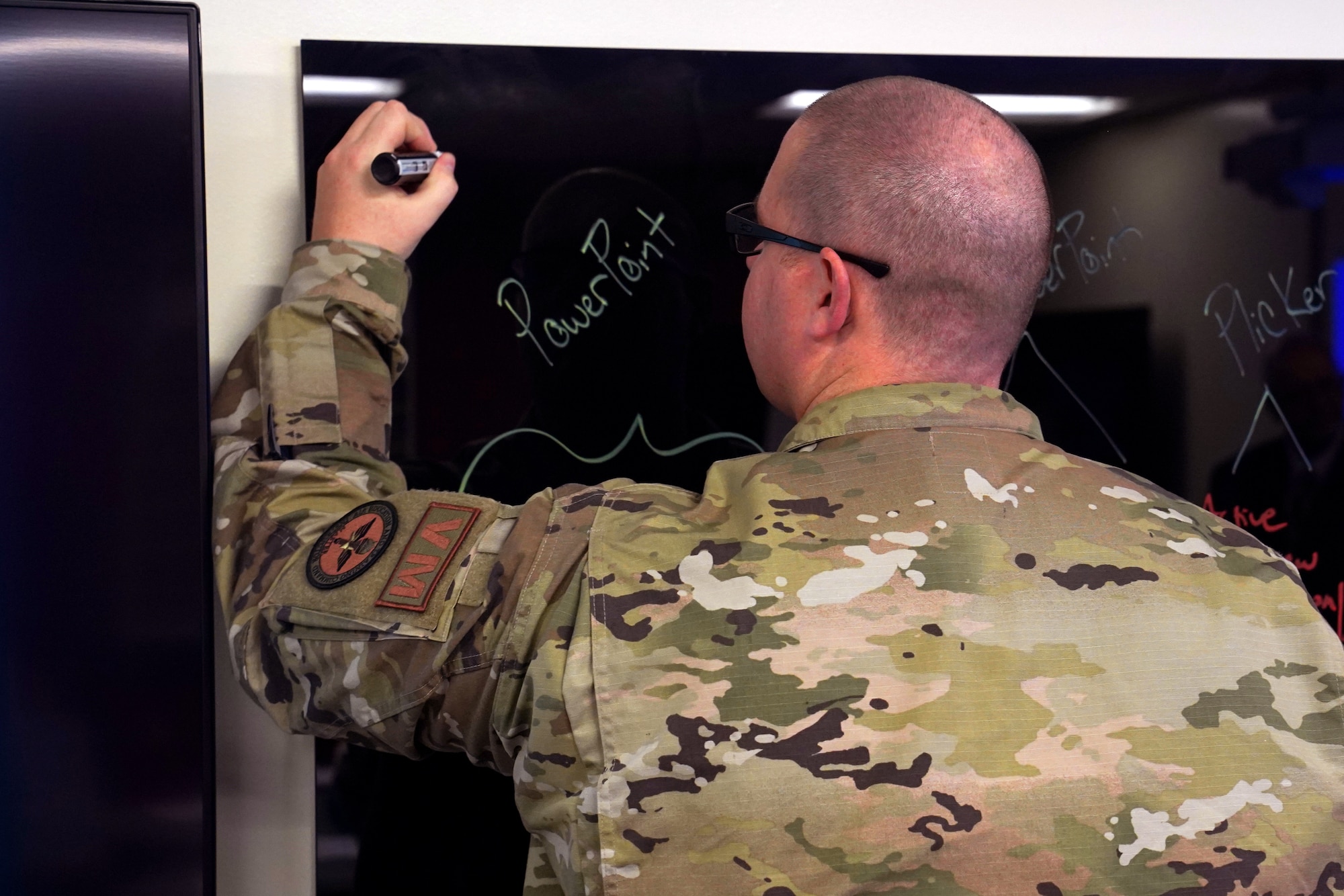 Tech. Sgt. Mykal Tanner, 344th TRS, Detachment 1 vehicle maintenance instructor, practices instruction during the Enhanced Learning & Instructional Techniques Enrichment course inside Allee Hall at Keesler Air Force Base, Mississippi, Nov. 19, 2021. The ELITE course introduces active and hands-on learning techniques to Air Force and Space Force instructors to enhance student engagement. (U.S. Air Force photo by Senior Airman Seth Haddix)
