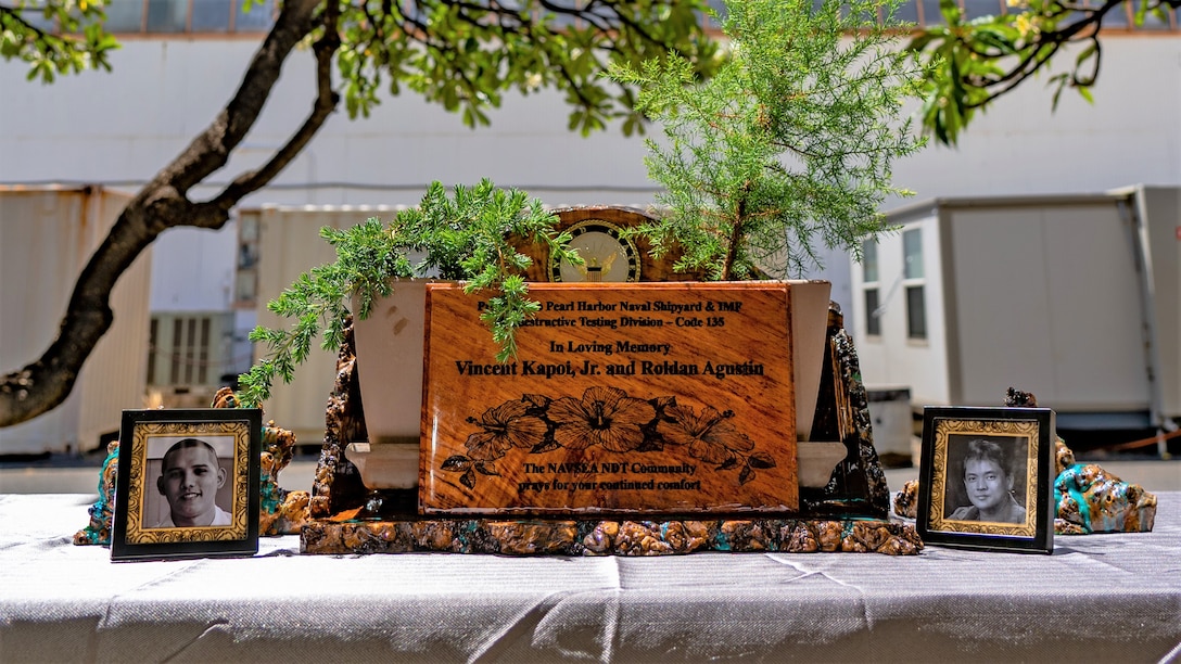A memorial planter box was unveiled, this summer, at the Quality Assurance office, Code 135, of Pearl Harbor Naval Shipyard and Intermediate Maintenance Facility as a gift honoring the memories of Roldan Agustin and Vince Kapoi, Jr. whose lives were sadly taken by an active-duty Sailor at Dry Dock 2, Dec. 4, 2019. (U.S. Navy photo by Dave Amodo released)