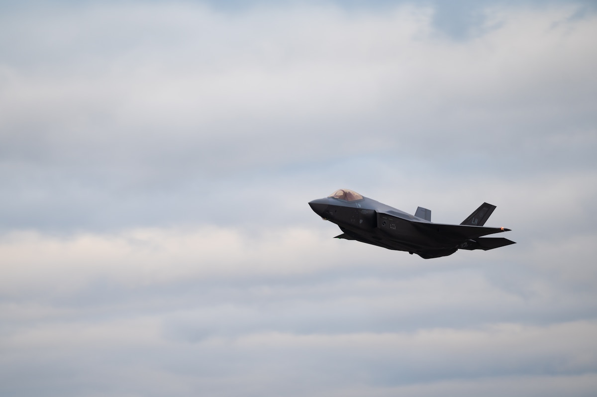 A U.S. Air Force F-35A Lightning II assigned to the 495th Fighter Squadron conducts a flyover upon arrival at Royal Air Force Lakenheath, Dec. 15, 2021. The Liberty Wing was selected to host the first F-35 squadrons in Europe based on numerous factors, to include existing infrastructure, history with supporting fighter operations and the combined training opportunities the UK has to offer. (U.S. Air Force photo by Senior Airman Koby I. Saunders)