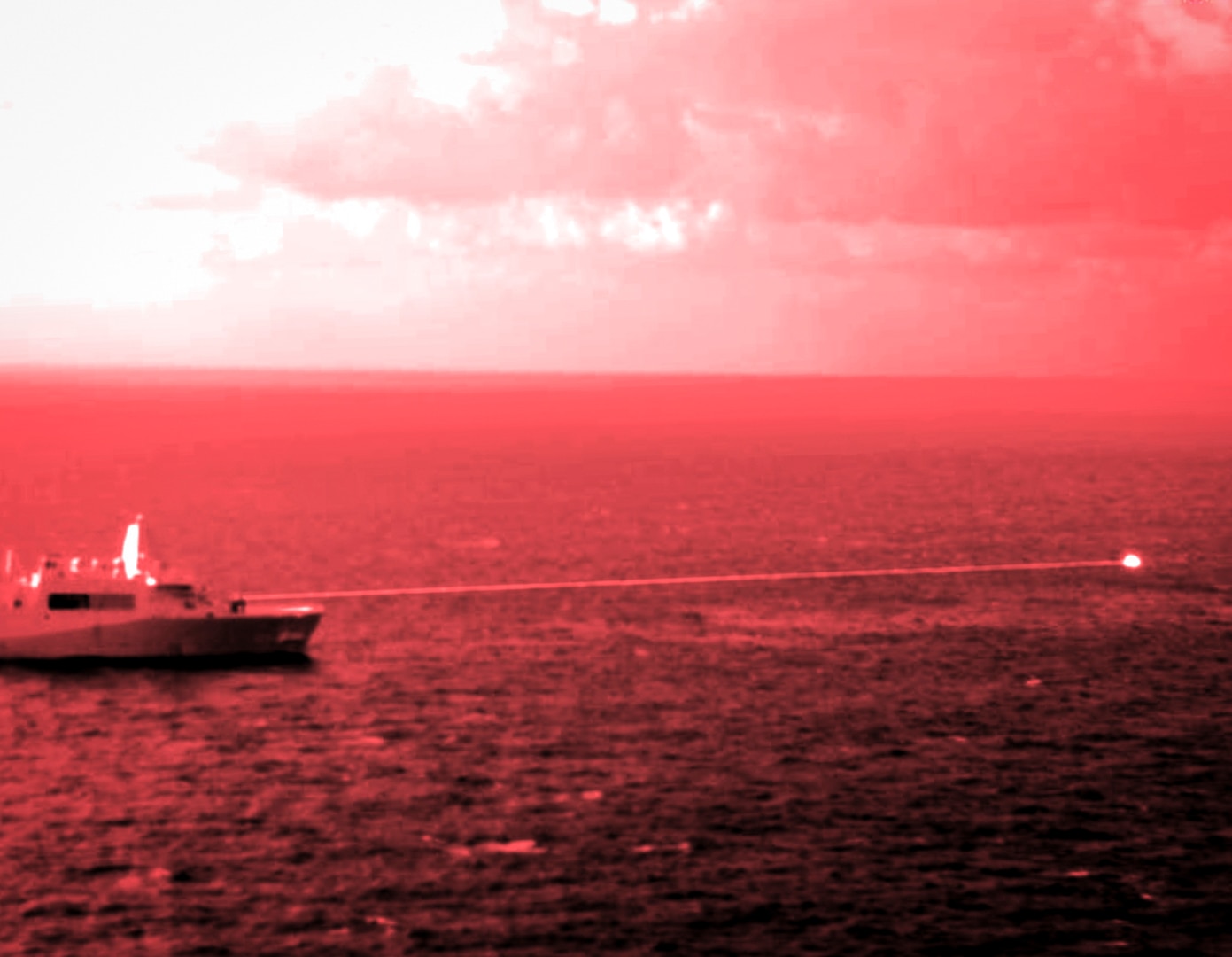 Amphibious transport dock ship USS Portland (LPD 27) conducts a high-energy laser weapon system demonstration on a static surface training target, Dec. 14, while sailing in the Gulf of Aden. During the demonstration, the Solid State Laser – Technology Maturation Laser Weapons System Demonstrator Mark 2 MOD 0 aboard Portland successfully engaged the training target.