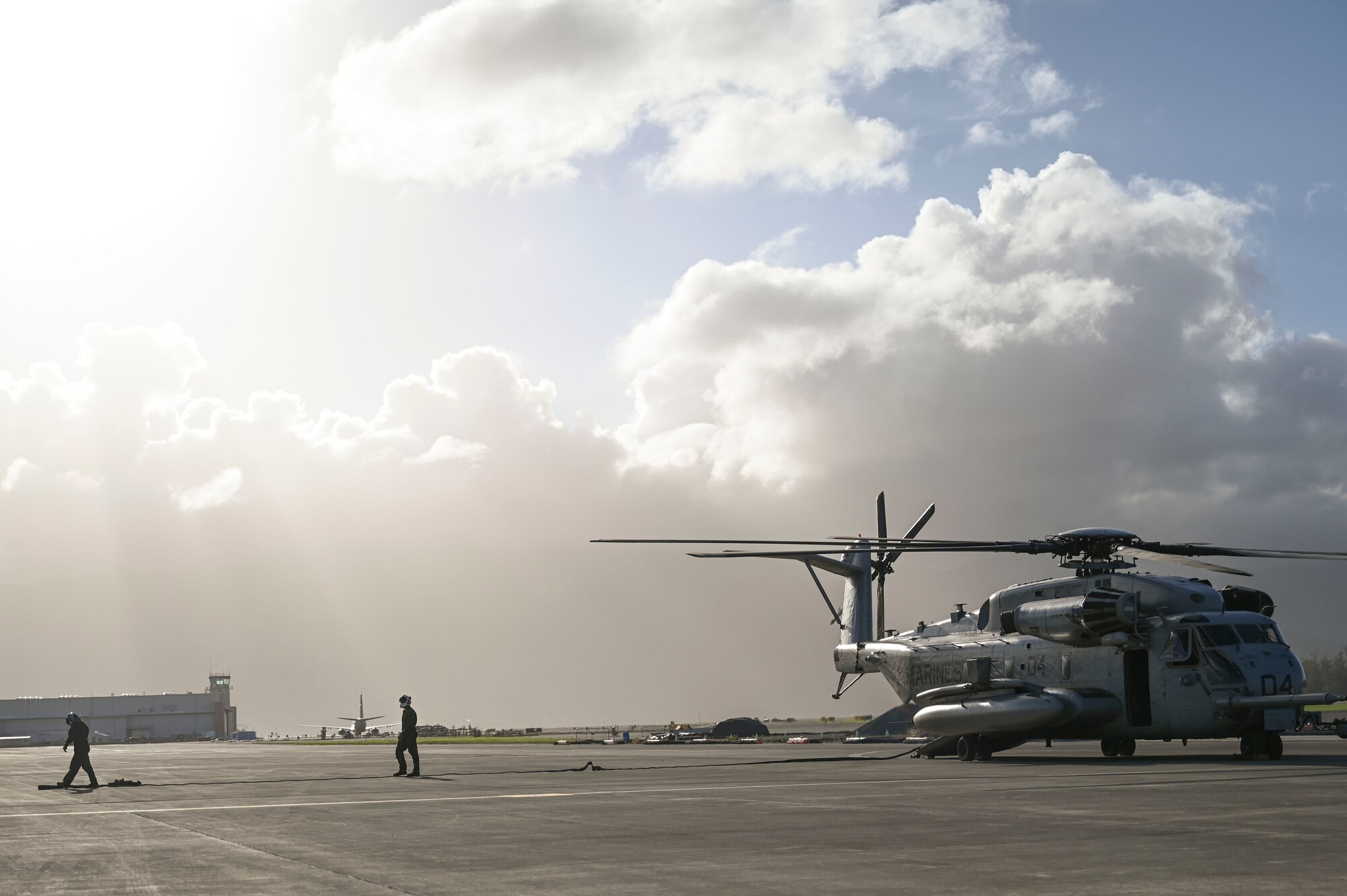 A U.S. Marine Corps Forward Area Refueling Point team practices aviation-delivered ground refueling (ADGR) from a CH-53 to A-10s during Exercise KANI WILDCAT. ADGR is frequently used for aircraft when unable to refuel in flight and/or to keep the aircraft closer to the fight.