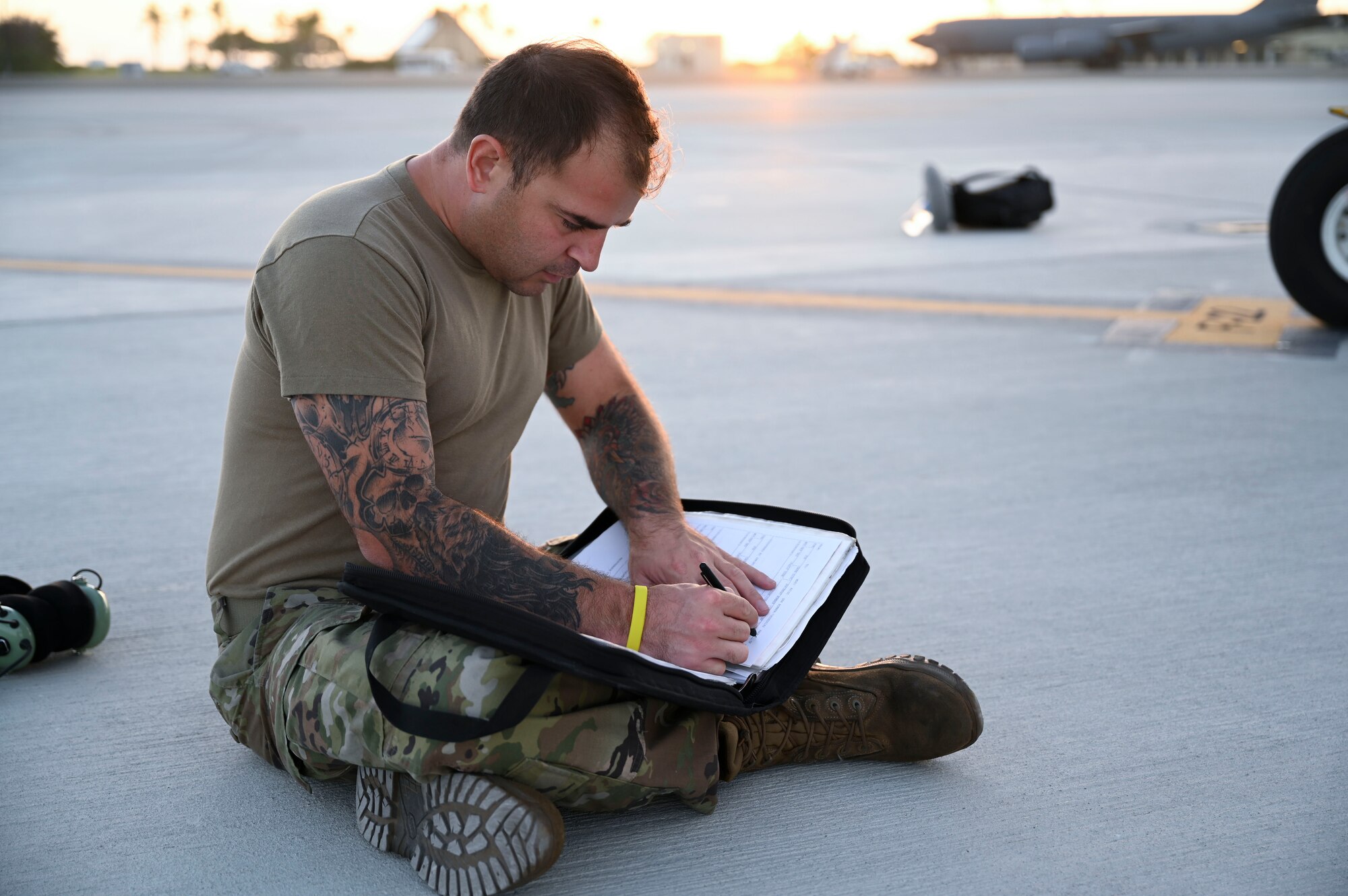 Tech. Sgt. Stephen Carrillo, an AATC A-10 Crew Chief, prepares for the return flight from Wake Island Airfield to Hawaii. The A-10s were an integral part of Exercise KANI WILDCAT, a multi-faceted ACE exercise that allowed for several testing events and integration with Air Force Special Warfare operators, A-10s, C-130s, F-22s, UH-1Ns, MV-22s and CH-53s.