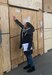 Diana Garland, the quality assurance supervisor at Transportation Division, Logistics Readiness Center Stuttgart, 405th Army Field Support Brigade, inspects a shipping crate at the warehouse. She has seven quality assurance people on her team, and they are a mix of Army civilians and local national employees. Their job is to be the liaison between the customers and the moving companies handling their household goods shipments. Garland said having a good combination of U.S. and local national employees on her team helps keep them all on their toes, helps them perform better as a team and helps make them more effective. (U.S. Army courtesy photo)