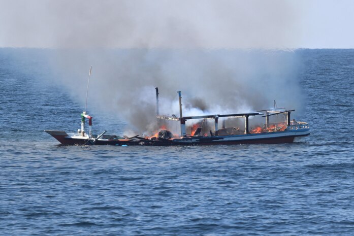 211215-N-NO146-1002
GULF OF OMAN (Dec. 15, 2021) A fire burns aboard a fishing vessel in the Gulf of Oman, Dec. 15.