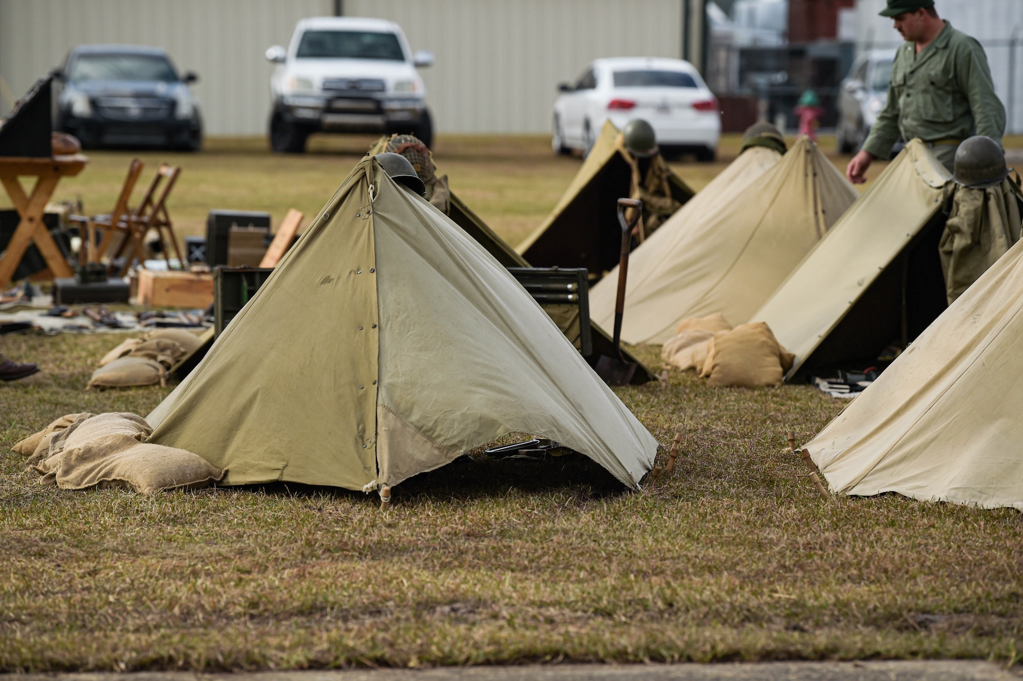 Tents are propped up in a grassy field during a WWII living history event at Douglas, Georgia, Dec. 4, 2021. Speakers from across the state of Georgia came together to bring WWII memorabilia and talk about historical events. (U.S. Air Force photo by Senior Airman Rebeckah Medeiros)