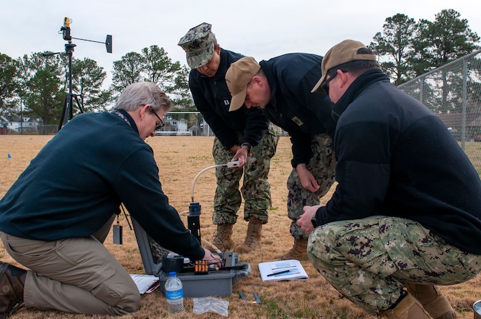 211209-N-AD372-115 PORTSMOUTH, VA (Dec. 9, 2021) Danny Brunick, an Industrial Hygienist with the Navy and Marine Corps Public Health Center, provides instruction on the operations of a deployable particulate sampler kit as part of a week-long training course at Portsmouth, VA. The occupational and environmental health site assessment course provided up-to-date practices and information which can be applied during forward deployed operations. (U.S. Navy photo by Abraham Essenmacher/Released)