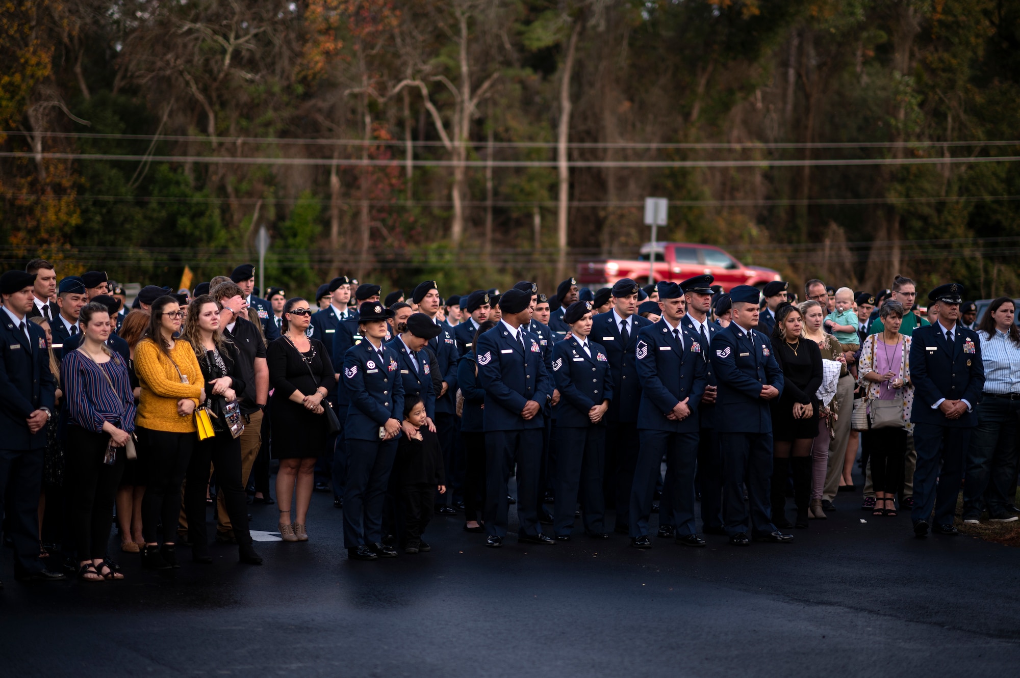Photo of people attending a funeral