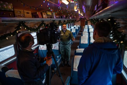 U.S. Army Staff Sgt. Brett Goertemoeller, 7-80th Transportation Brigade railway operations crewmember instructor, is interviewed by Wavy 10 News at Joint Base Langley-Eustis, Virginia, Dec. 10, 2021.